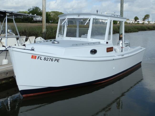 Arch Davis Jiffy V22 Skiff 2011, docked port side view