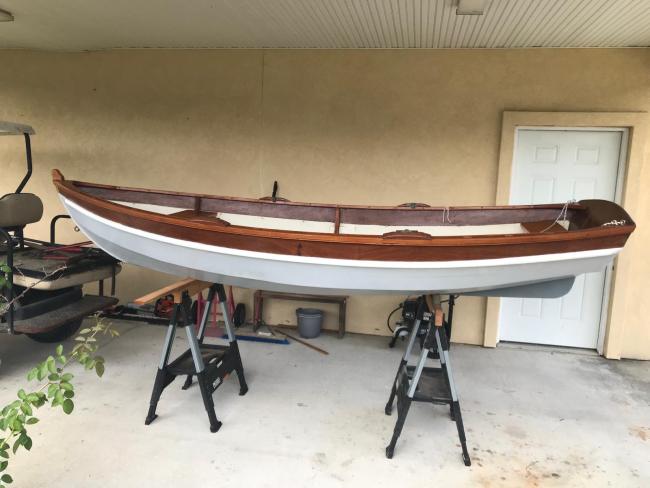 SHELLBACK SAILING DINGHY, on stands inside, port side view