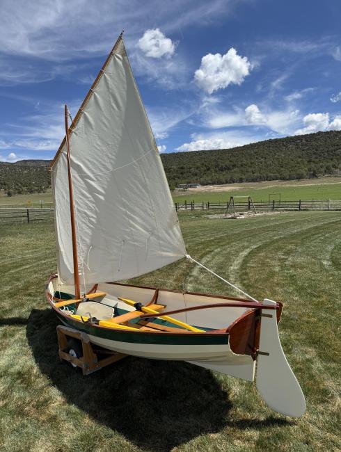 Acorn Skiff, on trailer, sail up, stern end port side