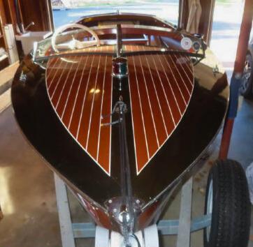 Great Wooden Boats Available for Sale & Lease, cris craft on trailer view of bow and topside looking towards stern