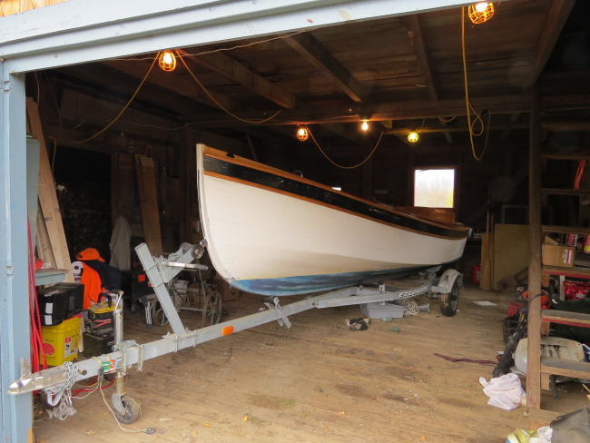 18' Handy Billy, on trailer in garage port side bow view