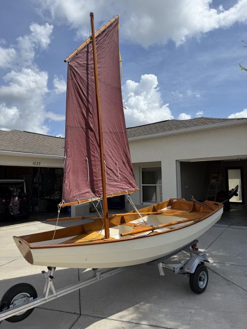 CLC Passagemaker Dinghy, on tariler sail up portside view