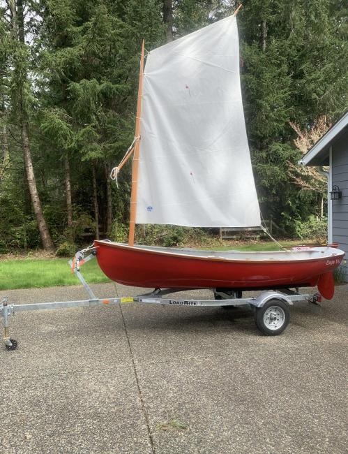 Catspaw Dinghy strip Plank Versian, on trailer sail up, port side view