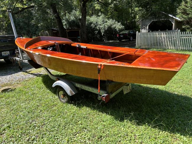 GERBER ALL-VARNISHED WOODEN SNIPE SAILBOAT, on trailer port side view