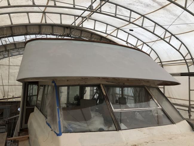 1965 Chris-Craft Constellation, stored inside looking at wheelhouse