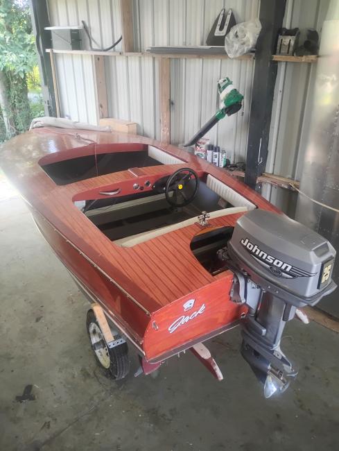 Glendale 12 ft plywood runabout, on trailer port side stern view