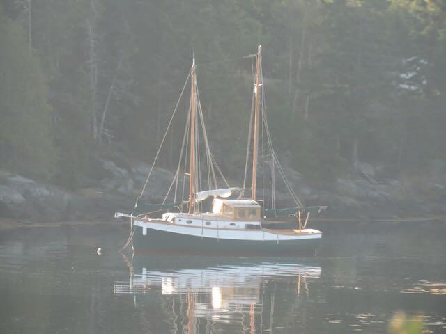 30' 1994 Bryan Motorsailer, in water port side view
