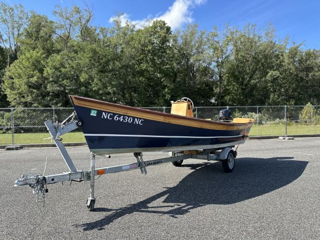CLC Peeler Skiff 16', on trailer port side view, bow end