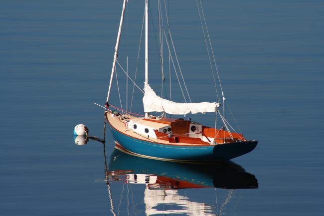 BRIDGES POINT 24, Sail #37, moored in water port side stern view