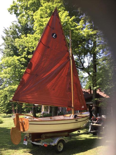 Lilou2 for sale, on trailer, sail up , starboard side stern view