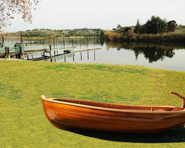Little Bear Wooden Dinghy 10', on grass port side view
