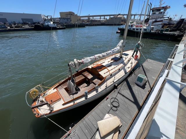 "MERRYWING" A 39' sloop, docked starboard side view from above