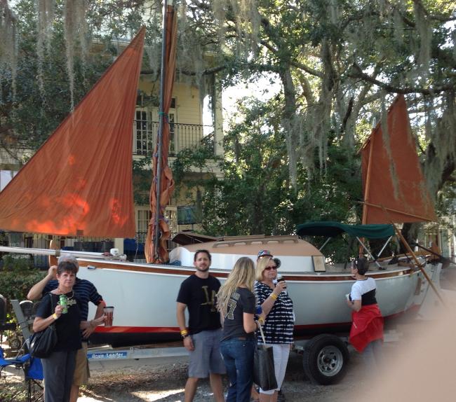 Orbus, a Steve Redmond Elver, on trailer sails, people, port side view