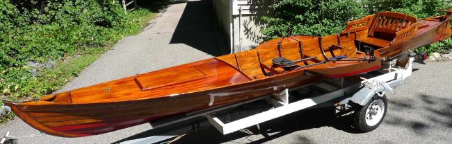 Thames River rowing skiff, on trailer port side bow view