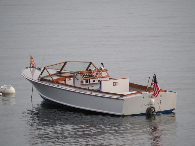 One of a Kind Runabout , in water port side stern view