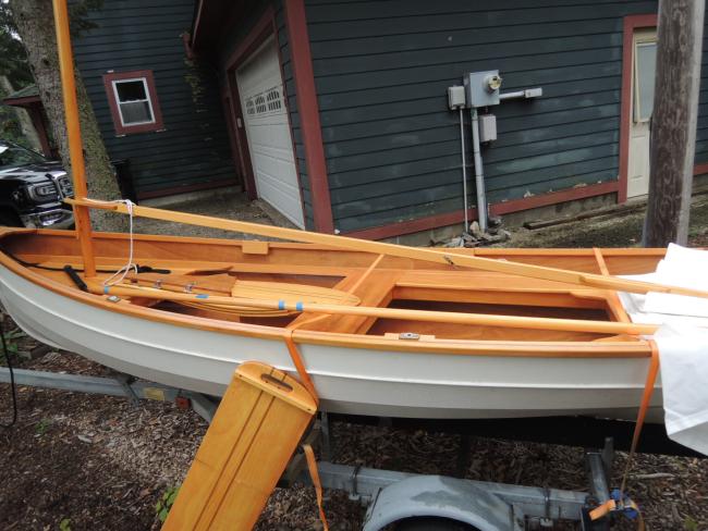 Penobscot 13 wooden sailboat, port side view