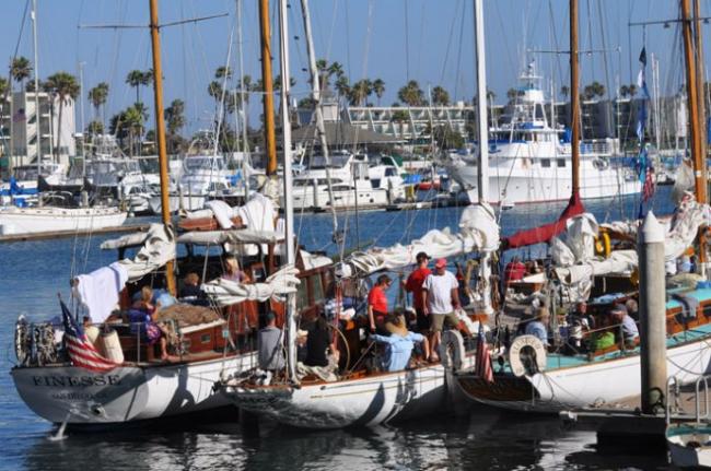 Wooden yachts rafted up at last year's McNish Classic Wooden Boat Race