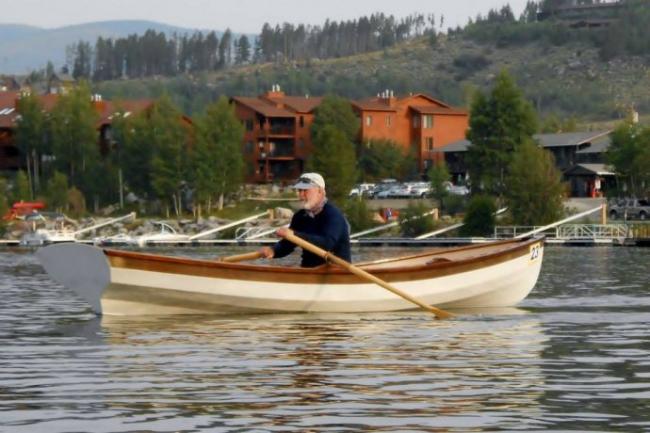 2013 Wherry Class competitor William McFaden races his handmade wherry in the 2013 Spirit of the Lake