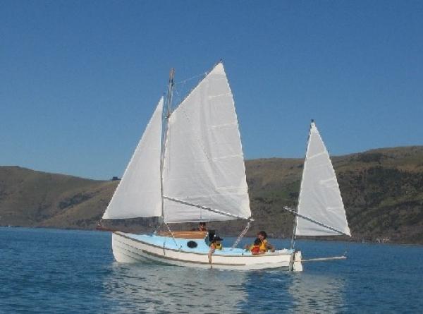 Peter Croft built his Pathfinder with the optional cabin, here he is on New Zealands Akaroa harbour