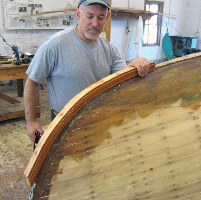 David Soule repairing a hull.