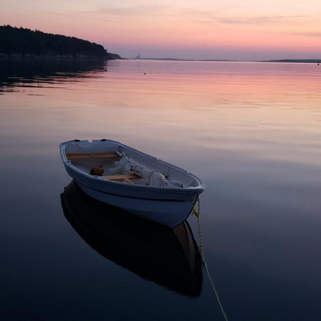 LOLA is a Joel White designed Shellback dinghy.