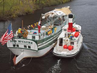 The tugboat C.L. CHURCHILL towing the LOIS McCLURE.