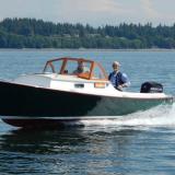 ADELINE at 20+ knots with designer/builder Sam Devlin at the helm.