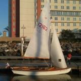 Snipe with sails up.