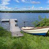 Semi-dory launched on a pond