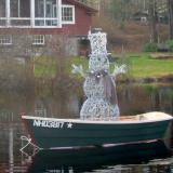Frosty pilots CHOCORUA around the mill pond