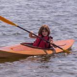 FLORA B., a Chesapeake Light Craft Wood Duckling kayak.