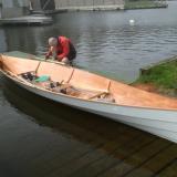 Sulkava two person sliding seat row boat that converts to a single.