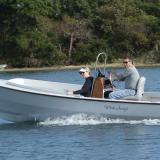 18' Port Townsend Skiff, underway port side view