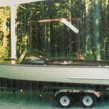 1959 23' Lyman Runabout, on trailer port side view