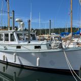 1972 Custom Sedan Cruiser, moored starboard bow side view