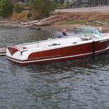 24' 1956 Century Coronado, in water, docked