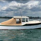 D Hylan Bowler design 26.5’  Pocket Downeast Cruiser, in water