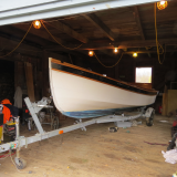 18' Handy Billy, on trailer in garage port side bow view