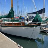 Freelance 38' wooden cutter, docked starboard side view