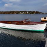 '57, 23' Lyman, runabout, docked starboard side view