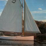 1978 Mystic Cat 15, in water sails up, starboards side view