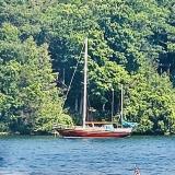 Rainmaker 1963 Yawl 39' bright finish, in water, port side view