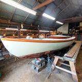Sanford Alerion #12, inside on stands, bow port side view
