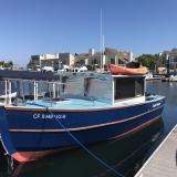 Surf Scoter Cruiser 22, docked port side bow view