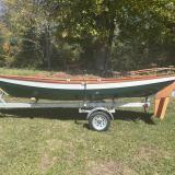 Ian Oughtred 16’ Amber Jack  Dory, on trailer on the grass