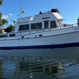Grand Banks luxury motor yacht, in water starboard side view