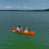 Wooden Canoe With Ribs Curved Bow 12', in water with people