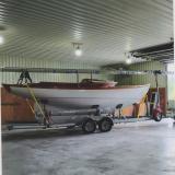 Herreshoff Alerion 26, inside on trailer Starboard side view