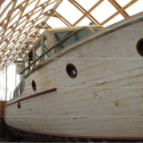 STEPHENS 43' Bridge Deck Cruiser 1930 Project Boat, stored inside starboard side view