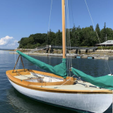 Original 1931 Herreshoff 12.5, in water starboard side view